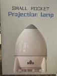 Projection Lamp S03 White Led Night Light Music Box Remote Control,small Rocket. Fixed Price $18.50.