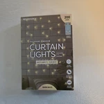 Merkury Cascading Curtain Lights 200 Led Battery Powered Indoor & Outdoor. Fixed Price $11.98.