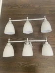(pair) Hampton Bay Solomone 22 In. 3-LIGHT Polished Chrome Vanity. Fixed Price $75.00.