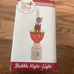 The Shelf Red Night Light Plug-in Rotary Shade Christmas Tradition. Fixed Price $14.99.