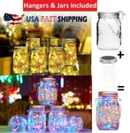 Solar Powered Fairy String Lights With Glass Mason Jar Hanging For Garden Decor. Fixed Price $82.99.
