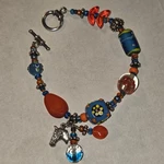Sterling Silver Multicolor Lamp Work Glass Beaded Bracelet Dangel Horse Charm. Fixed Price $80.00.