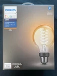 Philips Hue Edison Style G25 E26 Bluetooth Smart Led Light Bulb - Open Box. Fixed Price $38.99.