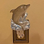 Dolphin And Ocean Wave Acrylic Electric Night Light By Midwest-cbk. Fixed Price $22.99.