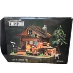 1077PC Light Up Wood Cabin Shenzhen Toy Building Set New Open Box F-C9066. Fixed Price $38.97.