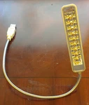 Trademark Gifts #628 Usb Book Light Portable Reading Lamp - Nine Leds. Fixed Price $5.95.