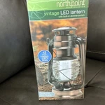 Northpoint Vintage Lantern, 12 Leds, Dimmer Switch, Copper/black, Battery. Fixed Price $20.45.