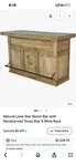 Rustic Light Brown Wood Bar Table With Handcarved Texas Star & Wine Rack. Fixed Price $1500.00.