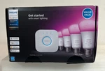 Philips Hue Starter Kit 4 E26 White And Color Ambient A19 Bulbs With Bridge. Fixed Price $118.98.