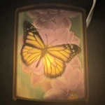 The Porcelain Garden Curved Lithophane Night Light Colored Butterfly. Fixed Price $26.00.
