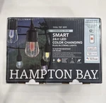 Hampton Bay Smart 24FT Led Color Changing String Lights, 12 Bulbs, Waterproof. Fixed Price $60.00.