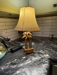 Tropical Palm Tree Table Lamp With Brown Wood Base And Beige Bell Shade. Fixed Price $25.00.