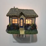 Thomas Kinkade Painter Of Candlelight Cottage Sculpted Night. Fixed Price $18.85.