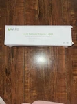 Oxyled Model T-01 Sensor Touch Light Swivel W/ On & Off. Fixed Price $8.00.