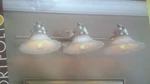 Nib Nice 3-LITE Nickel-finish Bathroom Vanity Light W/ White Floral Glass Shades. Fixed Price $89.95.