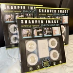 3 Sets Of 4 Sharper Image Wireless Remote Led Puck Light Set. Box. 12. Fixed Price $39.95.